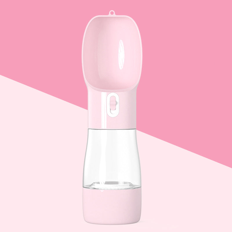 Pink portable dog water and treat dispenser